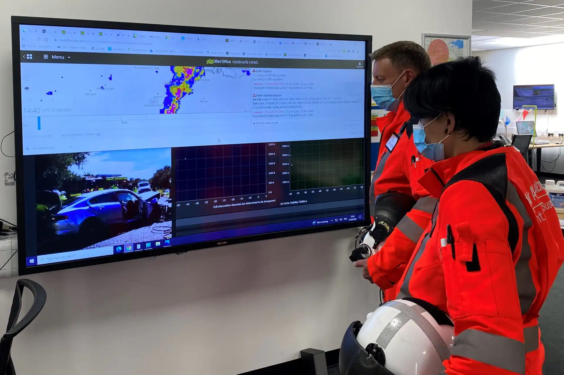 Our crew looking at footage from a call during the trial
