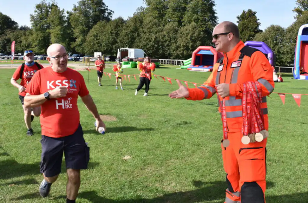 Crew members welcomed our Heli Hikers back to the finish