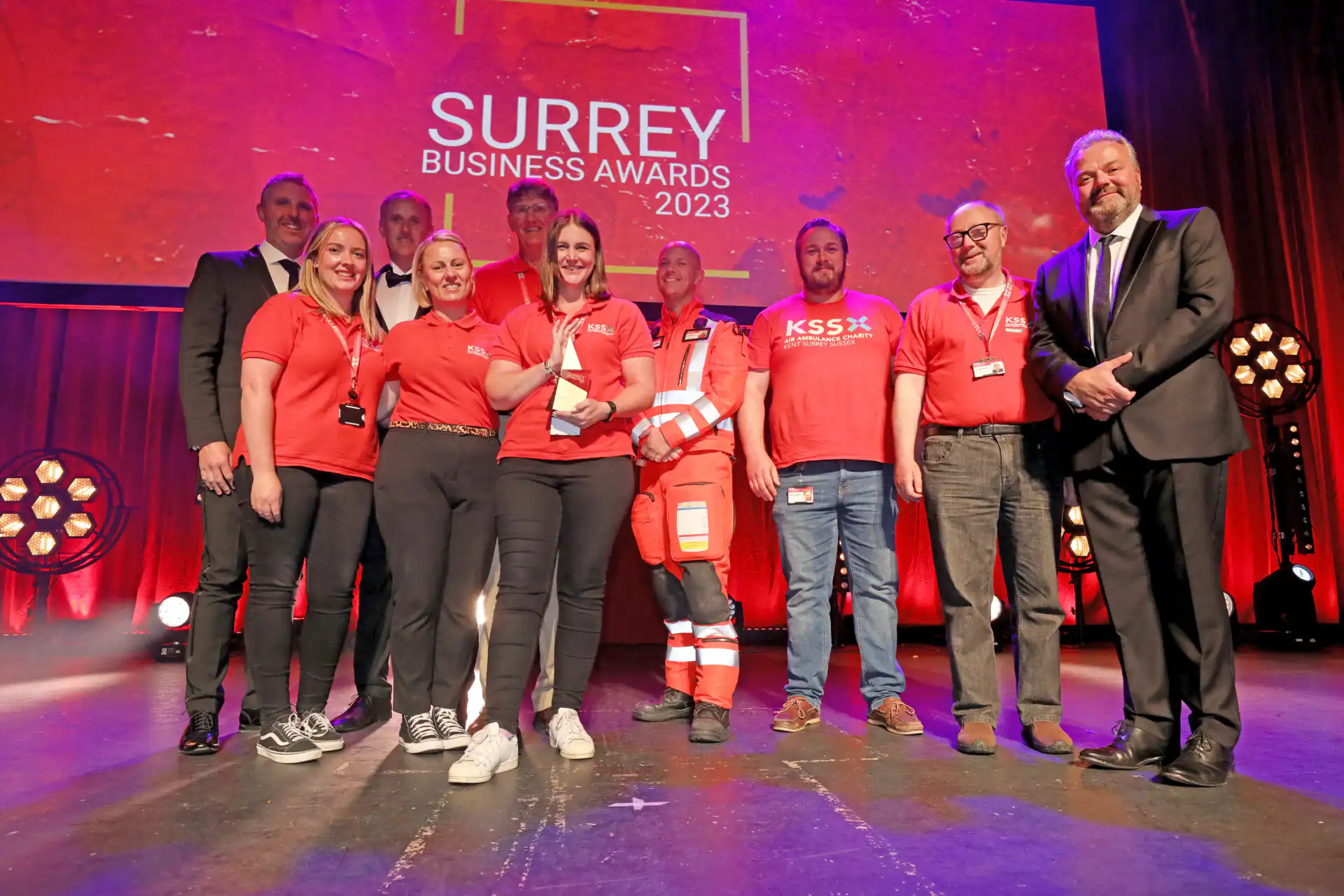 Team KSS on stage accepting Community hero Award at the Surrey Business Awards