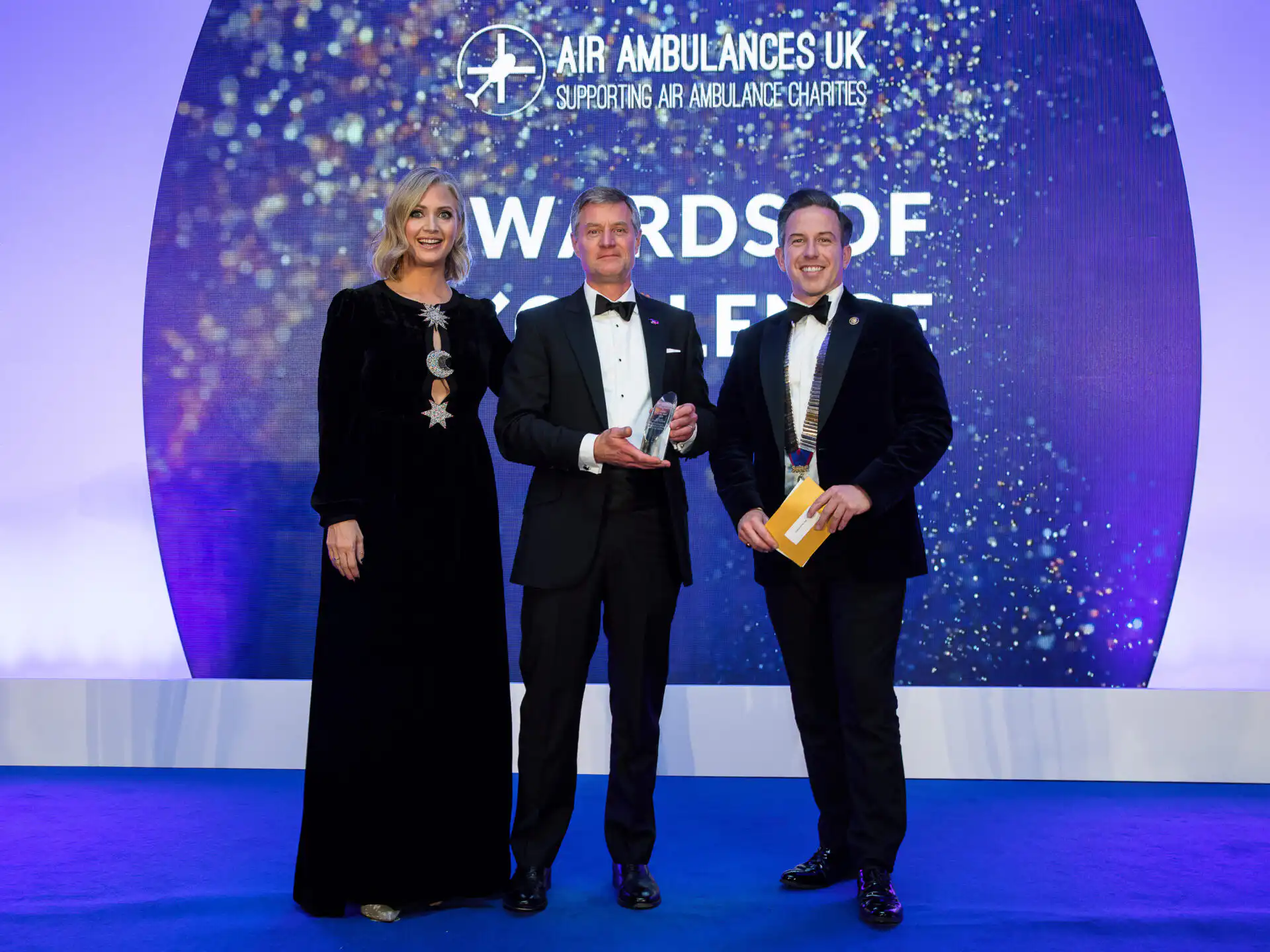 Barney receiving his award