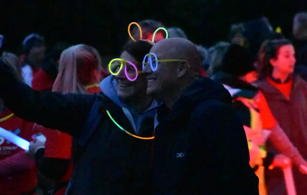 Walkers decorated themselves with glowsticks