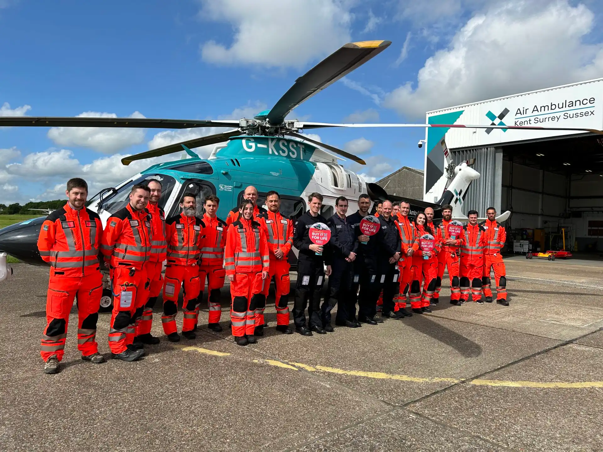 Air Ambulance crew in front of helicopter